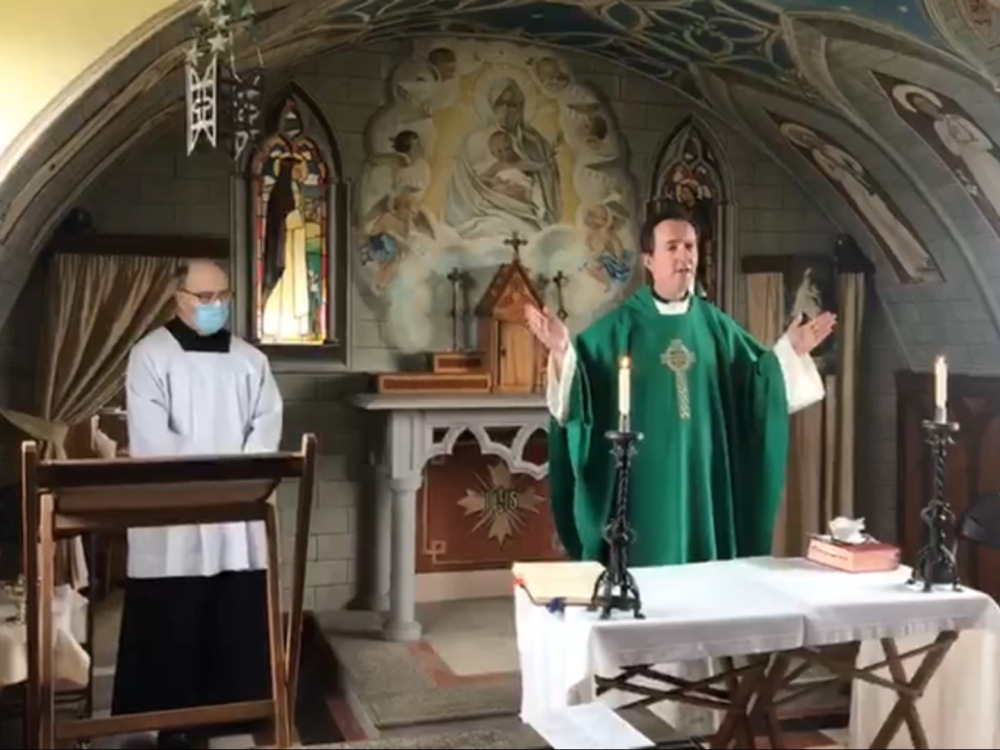 Fr. Gerry Maguiness celebrates Mass at the Italian Chapel